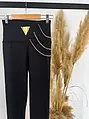 Bordázott anyagú leggings arany színű láncokkal