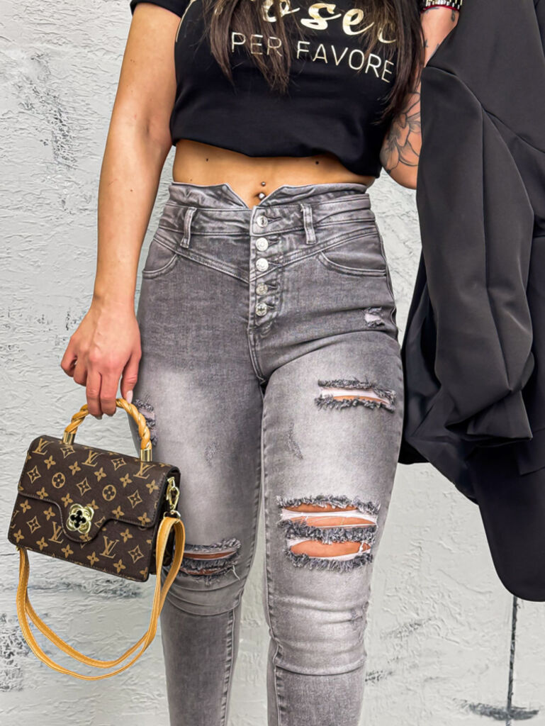 Magas derekú szaggatott skinny farmer