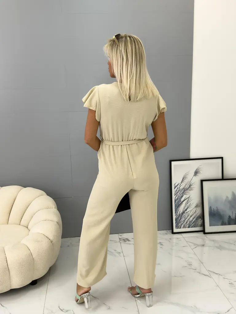 Elegáns bézs overál övvel YVONNE - next