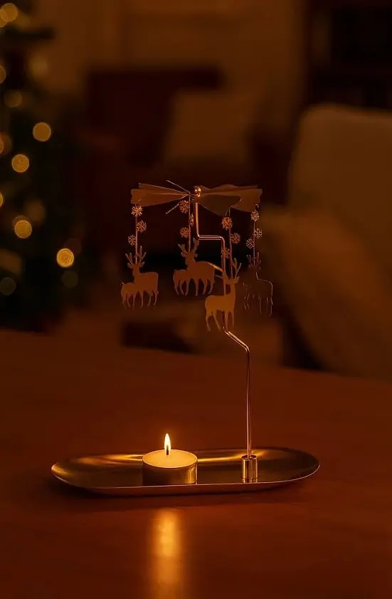 Karácsonyi forgó gyertyatartó