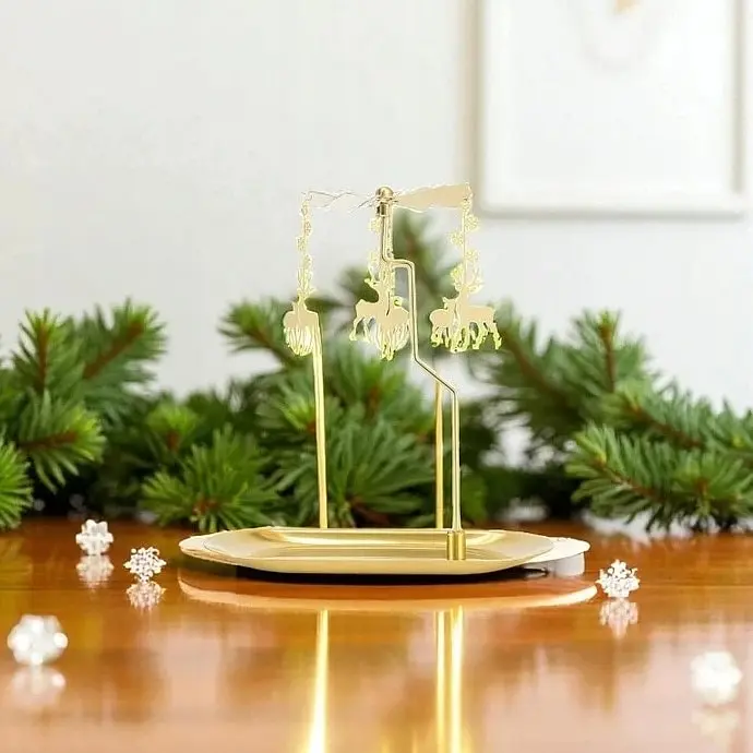 Karácsonyi forgó gyertyatartó