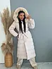 Hosszú téli kabát kapucnival és övvel NORDIC